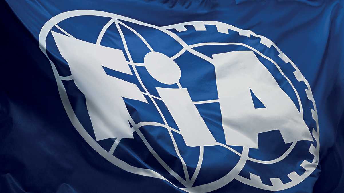 A blue FIA Official Flag waving